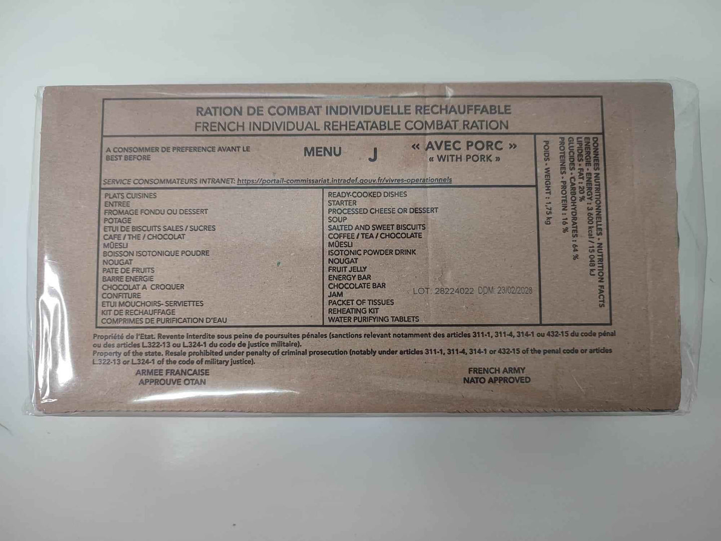 Ración militar francesa en bolsa marrón con etiqueta MENU J «avec porc»
