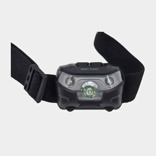 Linterna frontal LED MIL-TEC con carcasa gris y lente transparente, diadema negra